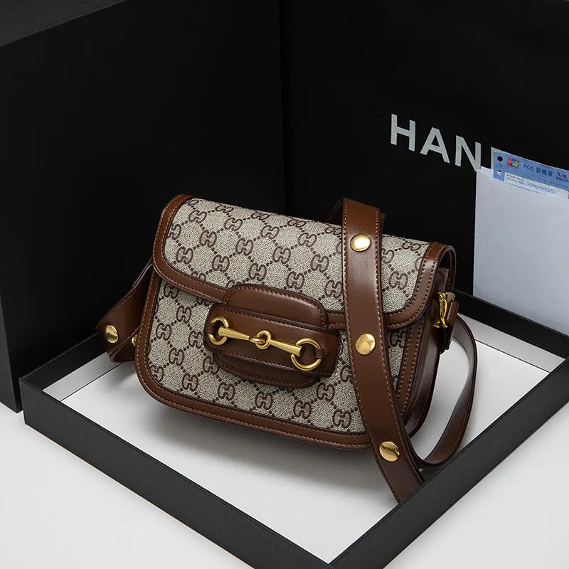 Ladies Genuine Leather Saddle Bag Versatile Crossbody Trendy underarm and single-shoulder design with a sleek, modern look. Compact, stylish, and perfect for everyday fashion.