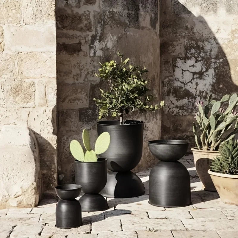 Iron Art Garden Planter for Villas & Outdoor Spaces Rust-resistant, uniquely shaped design with a sleek black finish. Floor-standing and versatile 2-way style for flexible display.