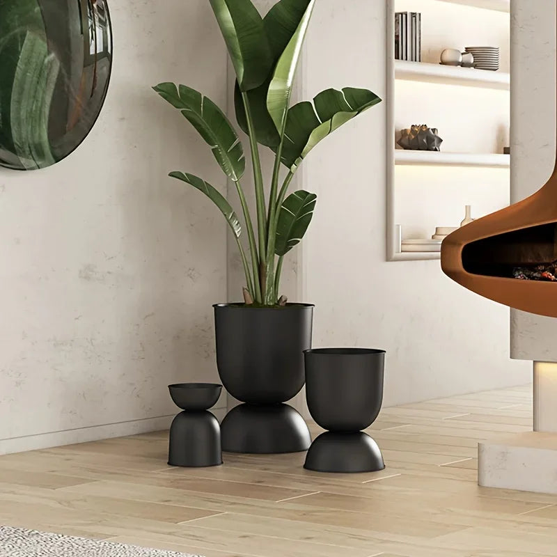 Iron Art Garden Planter for Villas & Outdoor Spaces Rust-resistant, uniquely shaped design with a sleek black finish. Floor-standing and versatile 2-way style for flexible display.