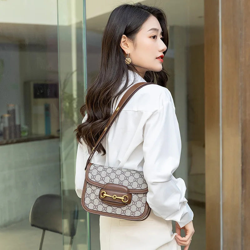 Ladies Genuine Leather Saddle Bag Versatile Crossbody Trendy underarm and single-shoulder design with a sleek, modern look. Compact, stylish, and perfect for everyday fashion.