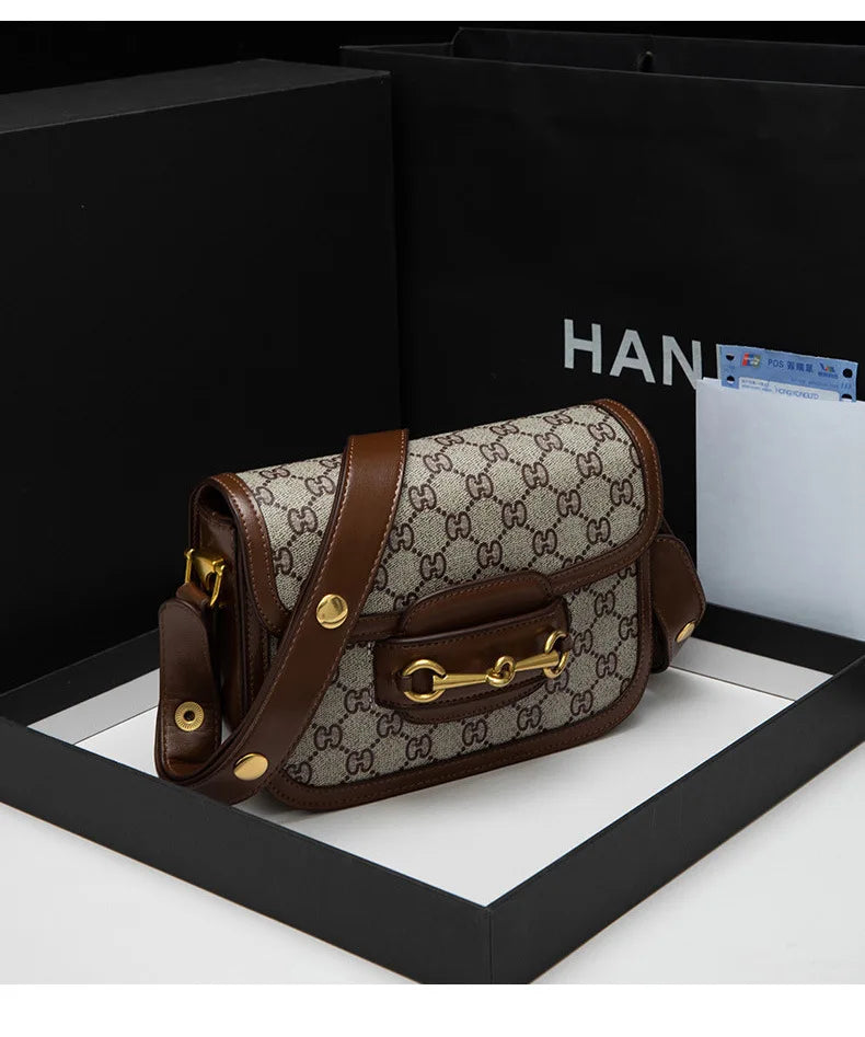 Ladies Genuine Leather Saddle Bag Versatile Crossbody Trendy underarm and single-shoulder design with a sleek, modern look. Compact, stylish, and perfect for everyday fashion.