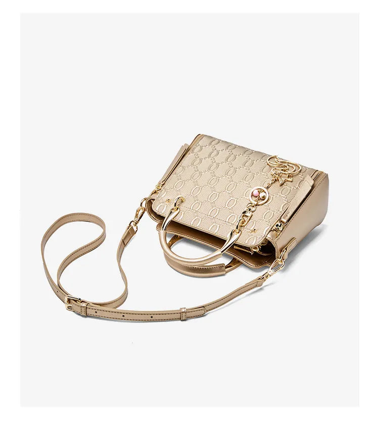 Cowhide Leather Women’s Handbag Luxury Design Elegant shoulder, crossbody, and tote style in one. Spacious and stylish, perfect for moms and everyday use.