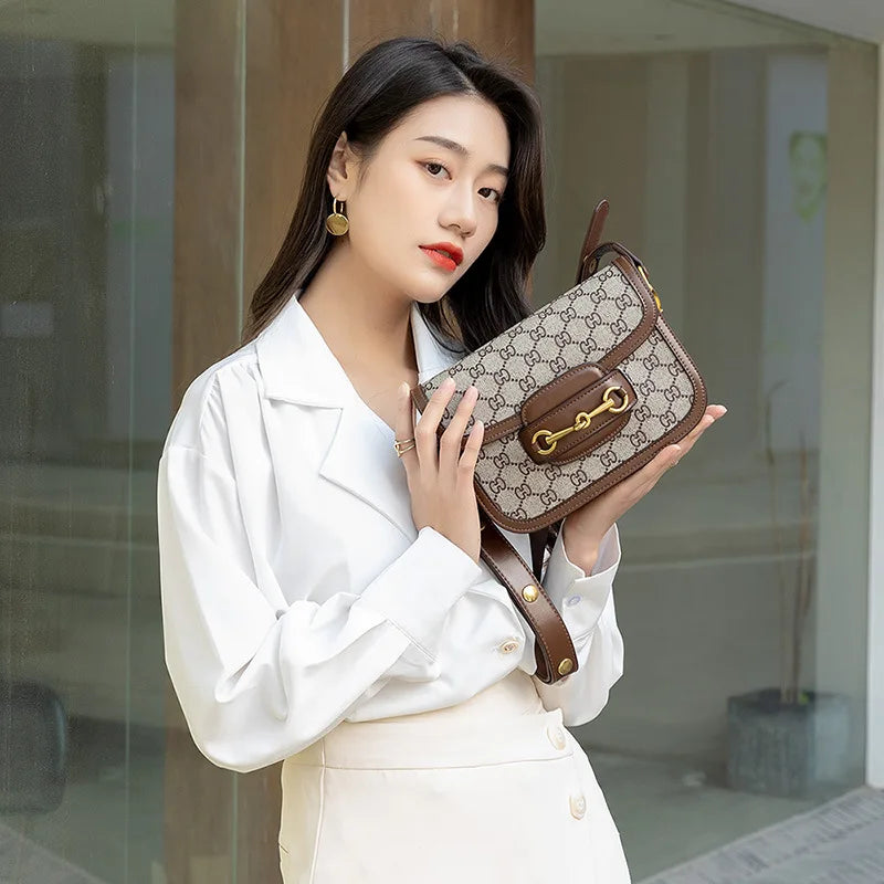 Ladies Genuine Leather Saddle Bag Versatile Crossbody Trendy underarm and single-shoulder design with a sleek, modern look. Compact, stylish, and perfect for everyday fashion.