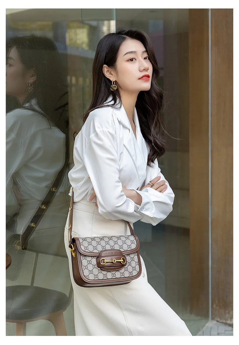 Ladies Genuine Leather Saddle Bag Versatile Crossbody Trendy underarm and single-shoulder design with a sleek, modern look. Compact, stylish, and perfect for everyday fashion.