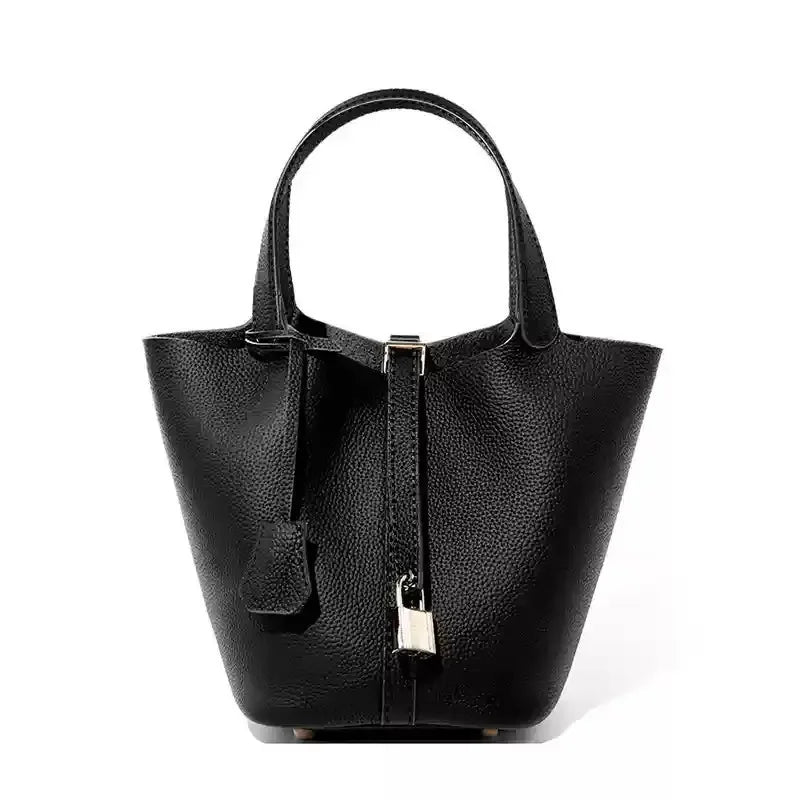 Women’s Leather Bucket Handbag A soft, stylish summer essential featuring a modern basket design with a convenient mobile phone pocket.