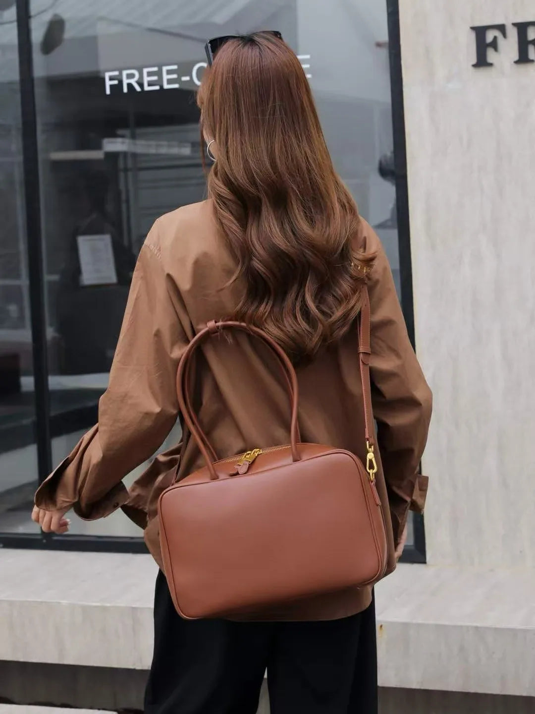 Luxury Genuine Leather Women’s Shoulder Bag Designer-style crossbody made from premium cowhide. Available in black, brown, and coffee colors with a spacious, elegant design for everyday use.