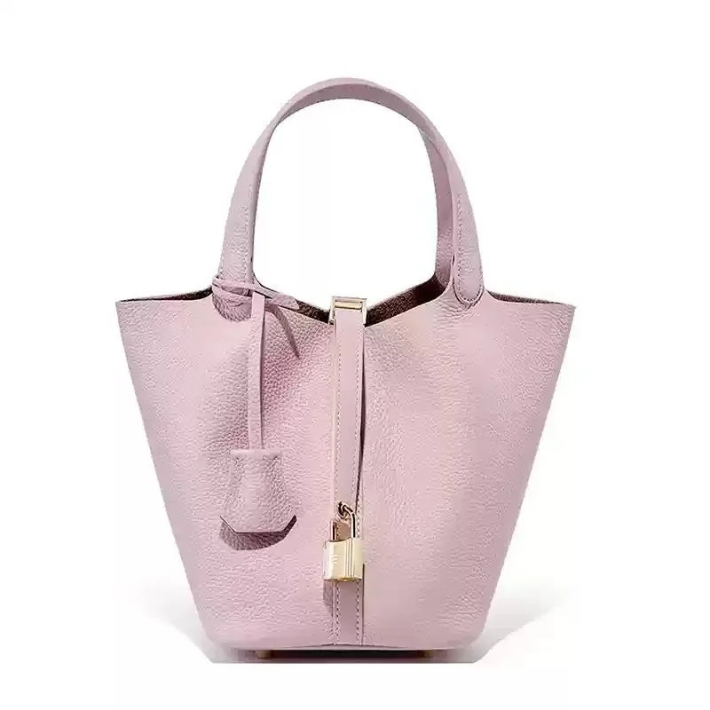 Women’s Leather Bucket Handbag A soft, stylish summer essential featuring a modern basket design with a convenient mobile phone pocket.