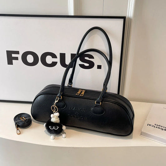 Stitched Pillow-Shape Shoulder Bag 
Trendy zippered handbag with a soft, structured design. Versatile for shoulder or hand carry perfect for everyday style.