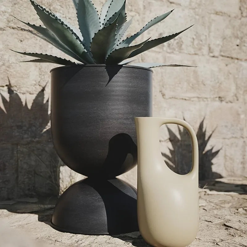 Iron Art Garden Planter for Villas & Outdoor Spaces Rust-resistant, uniquely shaped design with a sleek black finish. Floor-standing and versatile 2-way style for flexible display.