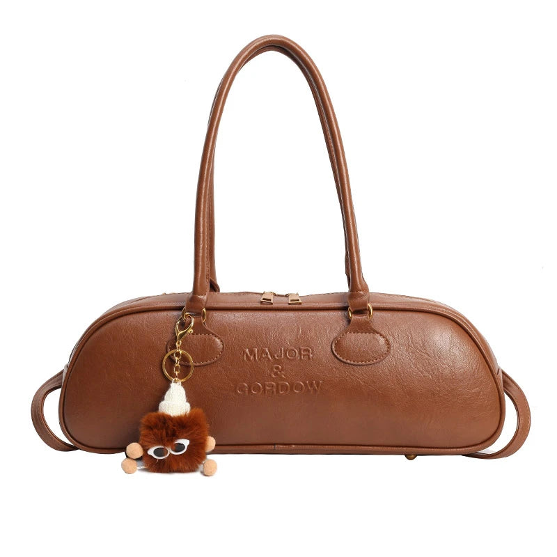 Stitched Pillow-Shape Shoulder Bag 
Trendy zippered handbag with a soft, structured design. Versatile for shoulder or hand carry perfect for everyday style.