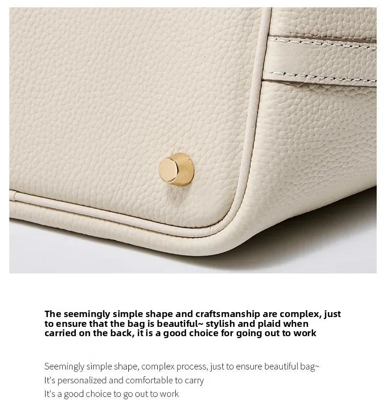 Women’s Leather Bucket Handbag A soft, stylish summer essential featuring a modern basket design with a convenient mobile phone pocket.