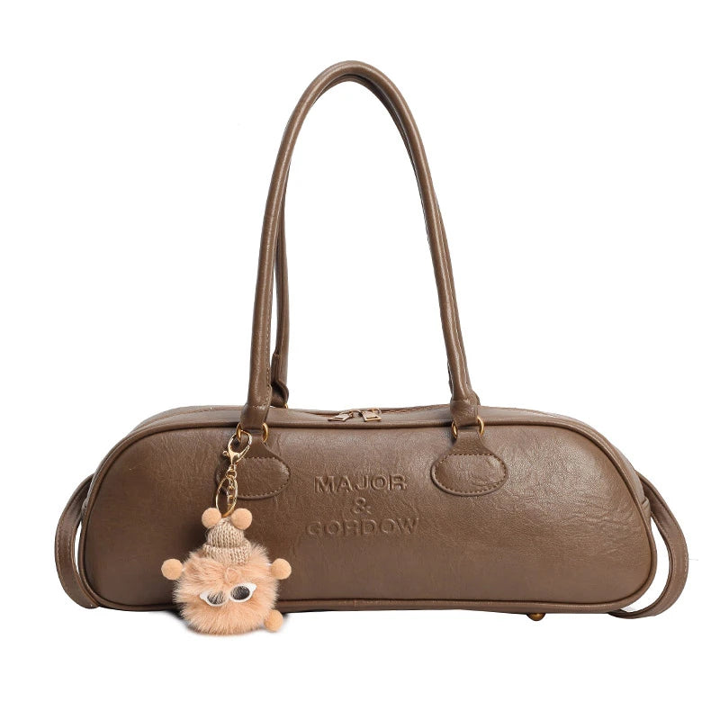 Stitched Pillow-Shape Shoulder Bag 
Trendy zippered handbag with a soft, structured design. Versatile for shoulder or hand carry perfect for everyday style.