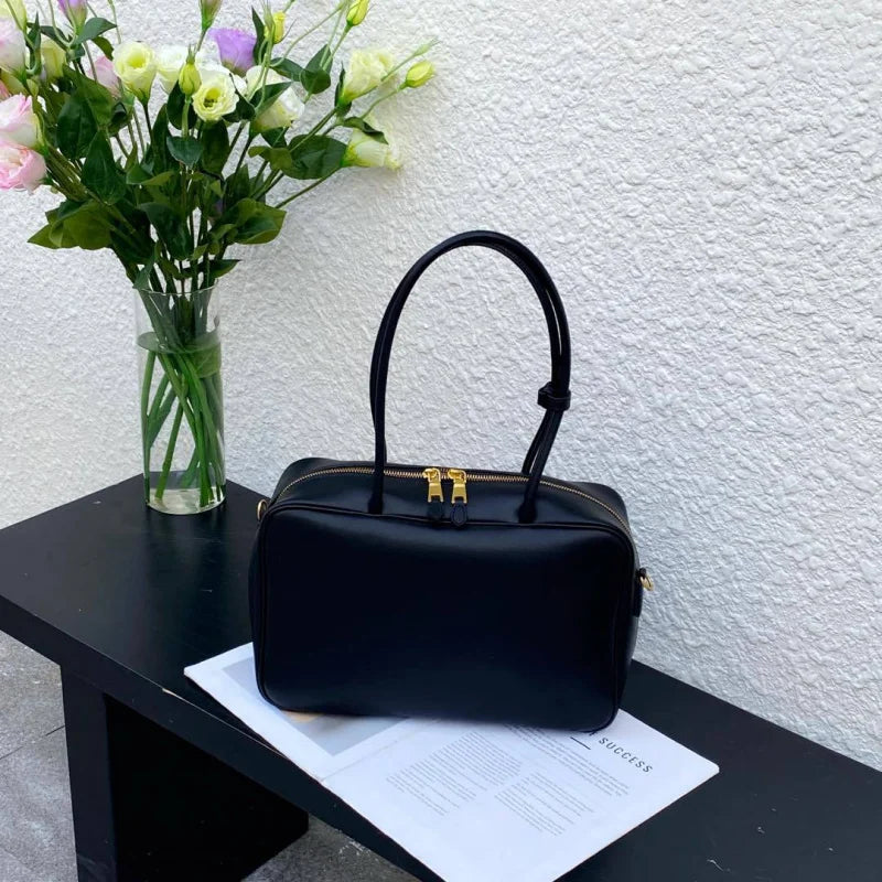 Luxury Genuine Leather Women’s Shoulder Bag Designer-style crossbody made from premium cowhide. Available in black, brown, and coffee colors with a spacious, elegant design for everyday use.