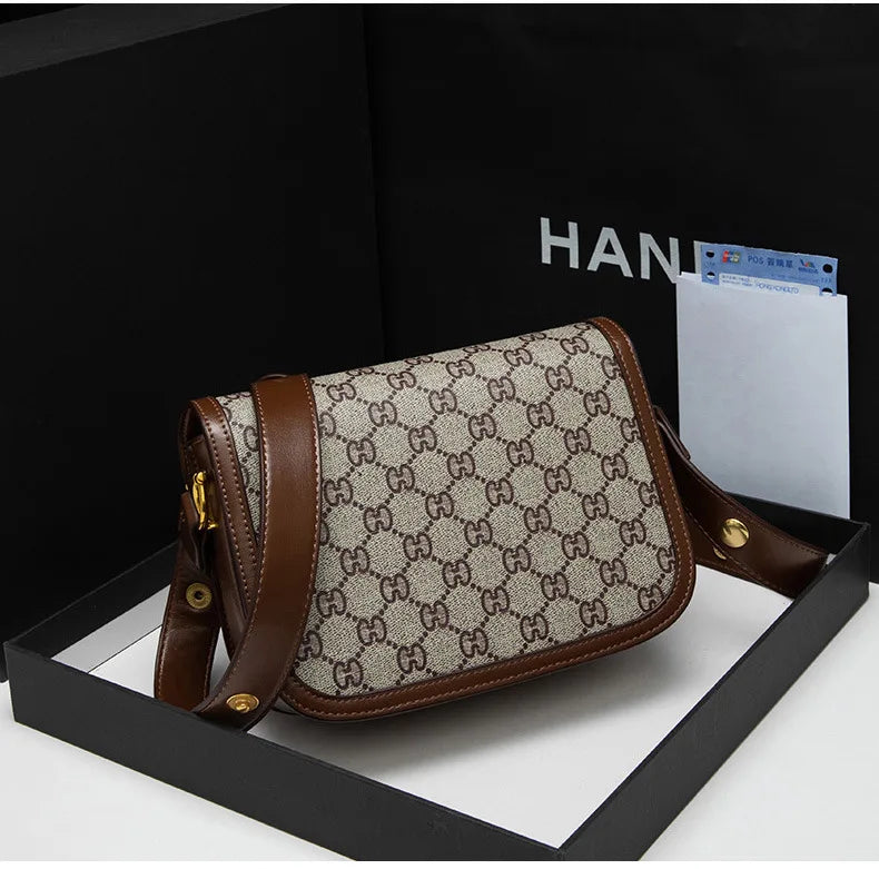 Ladies Genuine Leather Saddle Bag Versatile Crossbody Trendy underarm and single-shoulder design with a sleek, modern look. Compact, stylish, and perfect for everyday fashion.