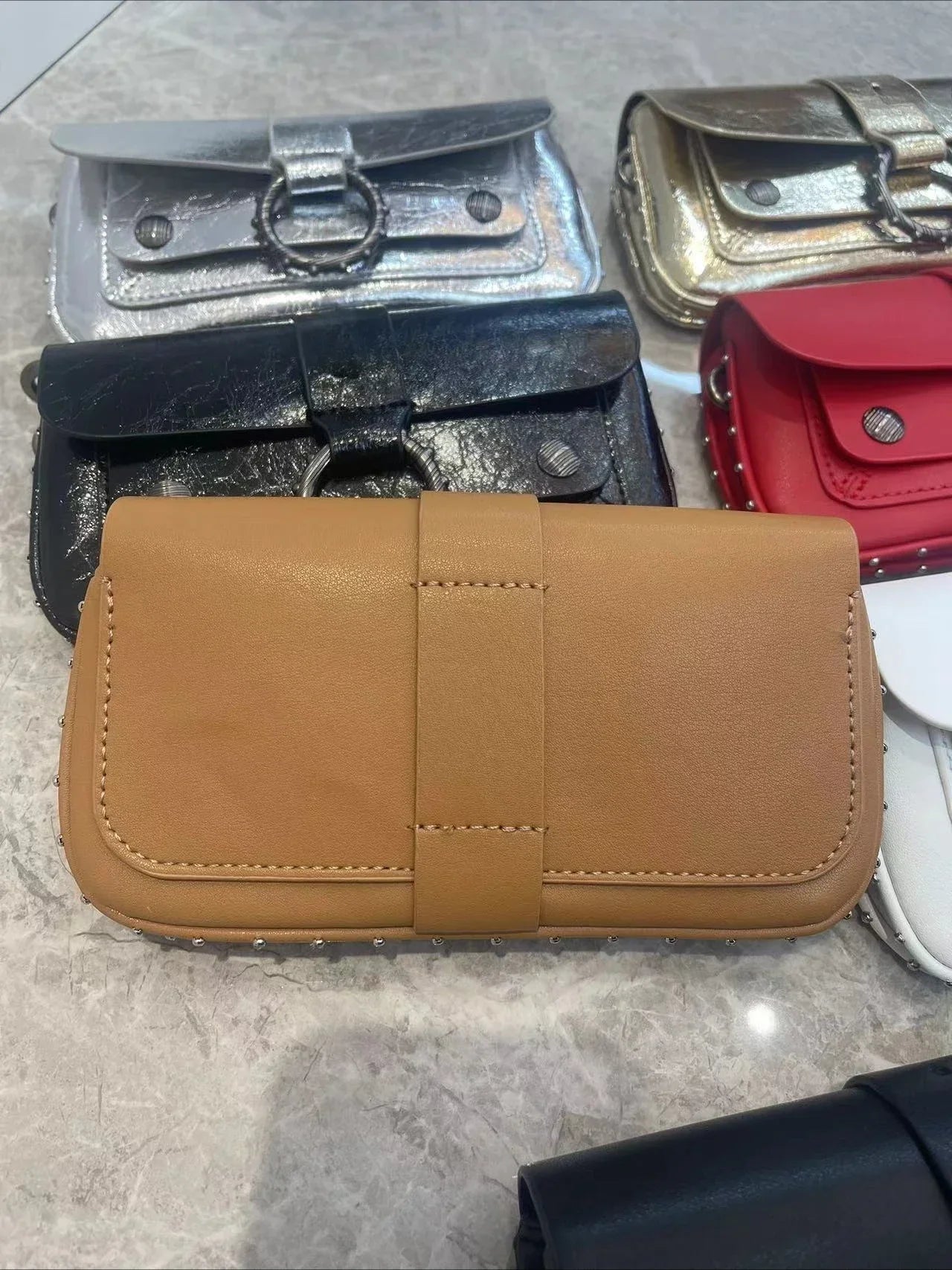 Multi-Color French Design Mini Waist Bag Classic Rivet Style Chic round design with a simple, versatile look. Compact and stylish, perfect for everyday wear.
