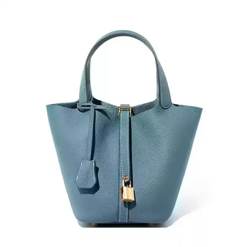 Women’s Leather Bucket Handbag A soft, stylish summer essential featuring a modern basket design with a convenient mobile phone pocket.