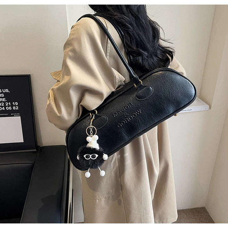 Stitched Pillow-Shape Shoulder Bag 
Trendy zippered handbag with a soft, structured design. Versatile for shoulder or hand carry perfect for everyday style.