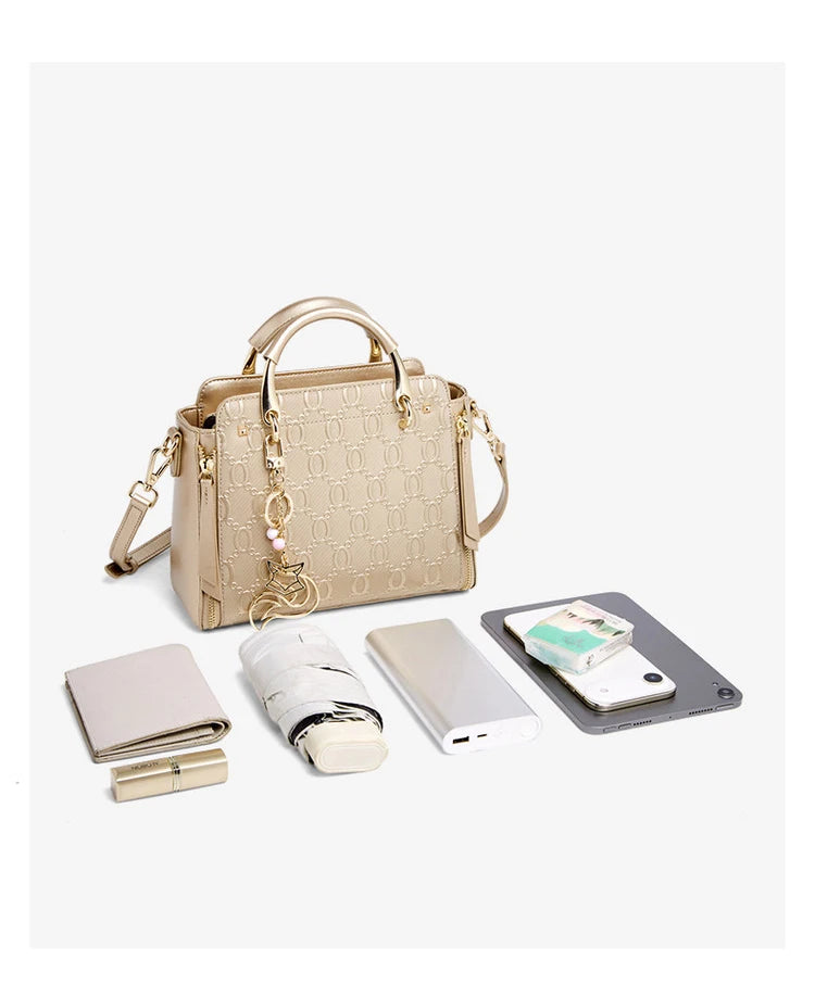 Cowhide Leather Women’s Handbag Luxury Design Elegant shoulder, crossbody, and tote style in one. Spacious and stylish, perfect for moms and everyday use.