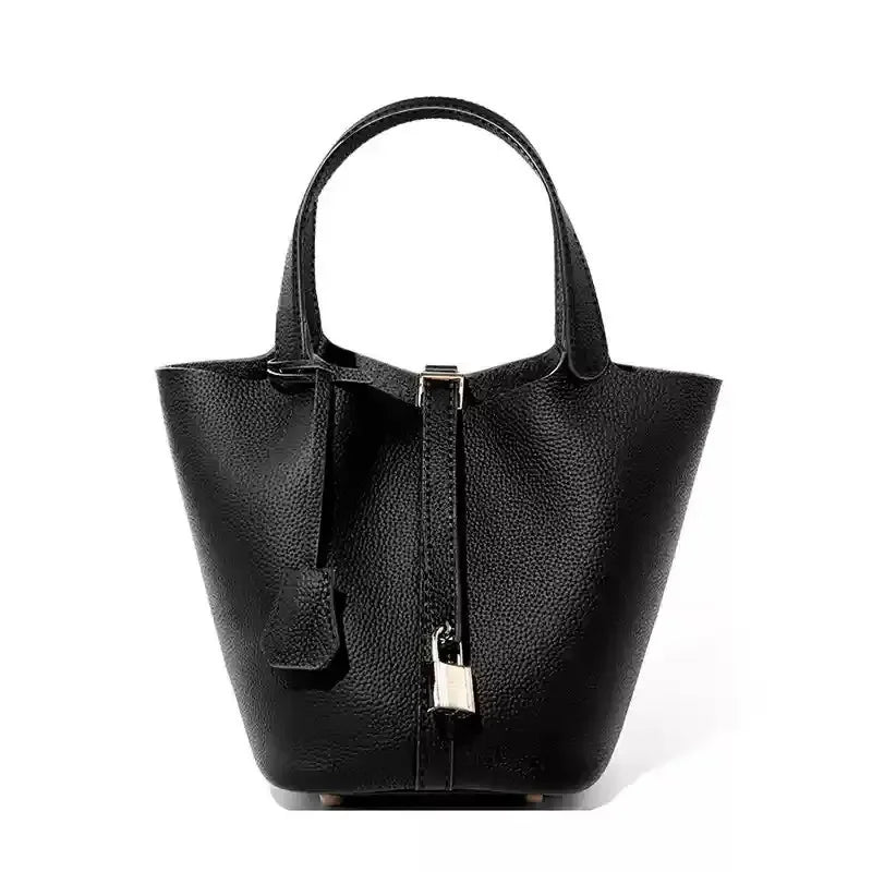 Women’s Leather Bucket Handbag A soft, stylish summer essential featuring a modern basket design with a convenient mobile phone pocket.