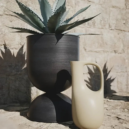 Iron Art Garden Planter for Villas & Outdoor Spaces Rust-resistant, uniquely shaped design with a sleek black finish. Floor-standing and versatile 2-way style for flexible display.