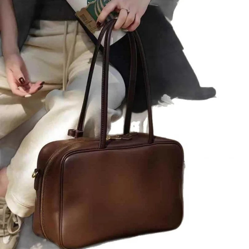 Luxury Genuine Leather Women’s Shoulder Bag Designer-style crossbody made from premium cowhide. Available in black, brown, and coffee colors with a spacious, elegant design for everyday use.