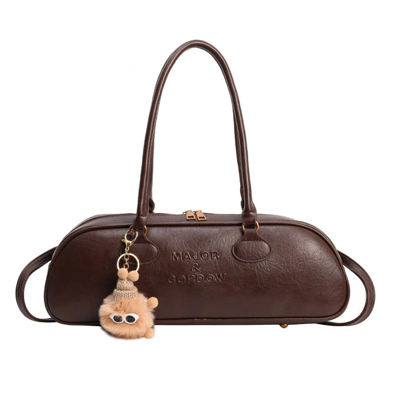 Stitched Pillow-Shape Shoulder Bag 
Trendy zippered handbag with a soft, structured design. Versatile for shoulder or hand carry perfect for everyday style.